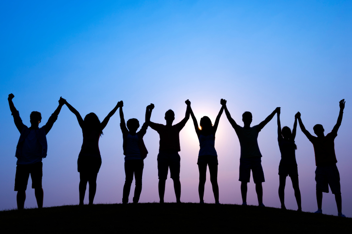 people_holding_hands_to_show_unity